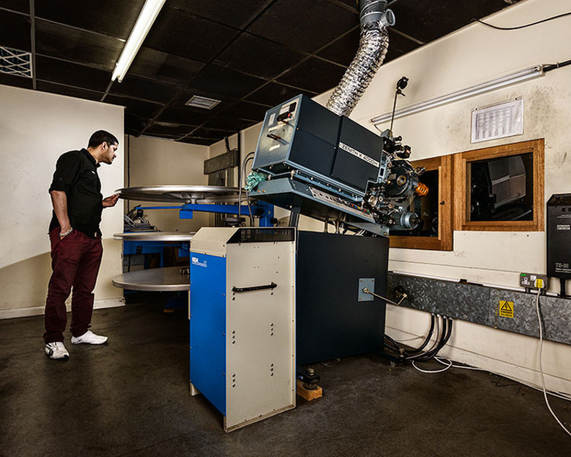 Projectionist Abdul Kaher and a Platter Loading System, Genesis Cinema, London